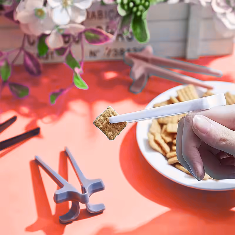 Gamer Finger Chopsticks were made, the simple, clever tool every gamer (and snack lover) needs.