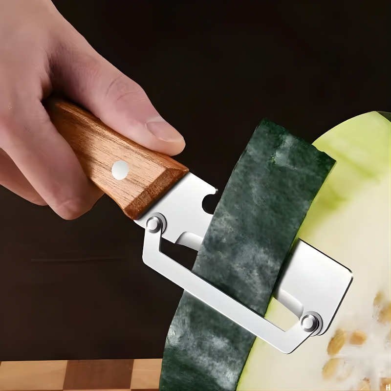 Stainless steel peeler with wooden handle for peeling and slicing fruits and vegetables  Durable and smooth operation