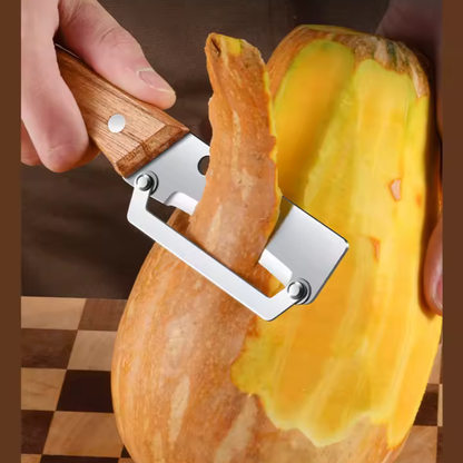 Stainless steel peeler with wooden handle for peeling and slicing fruits and vegetables  Durable and smooth operation